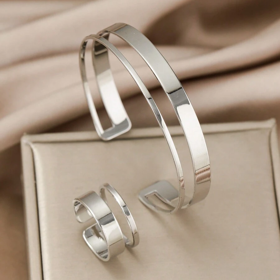 Set di semigioielli: bracciale e anello geometrico parallelo minimalista
