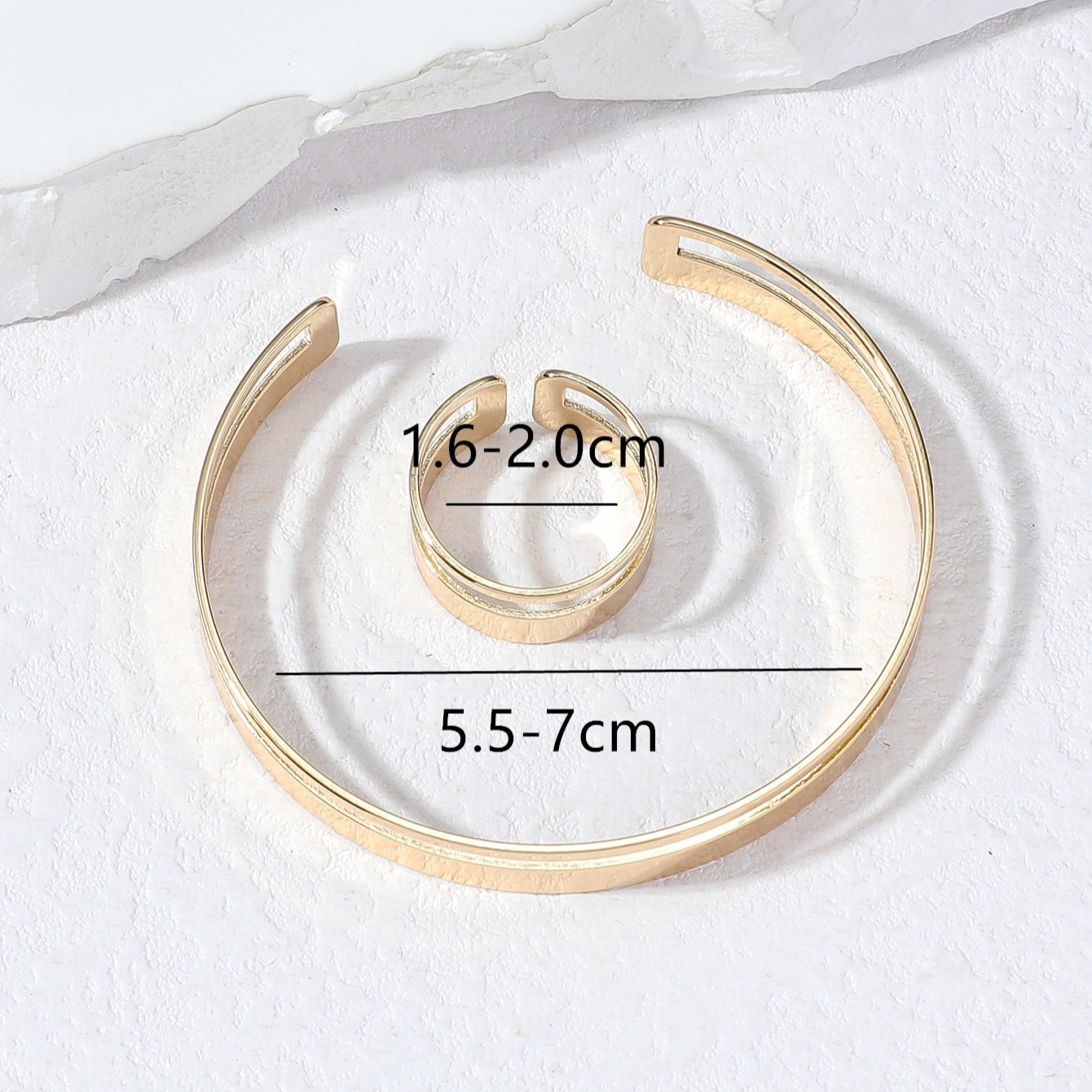 Set di semigioielli: bracciale e anello geometrico parallelo minimalista