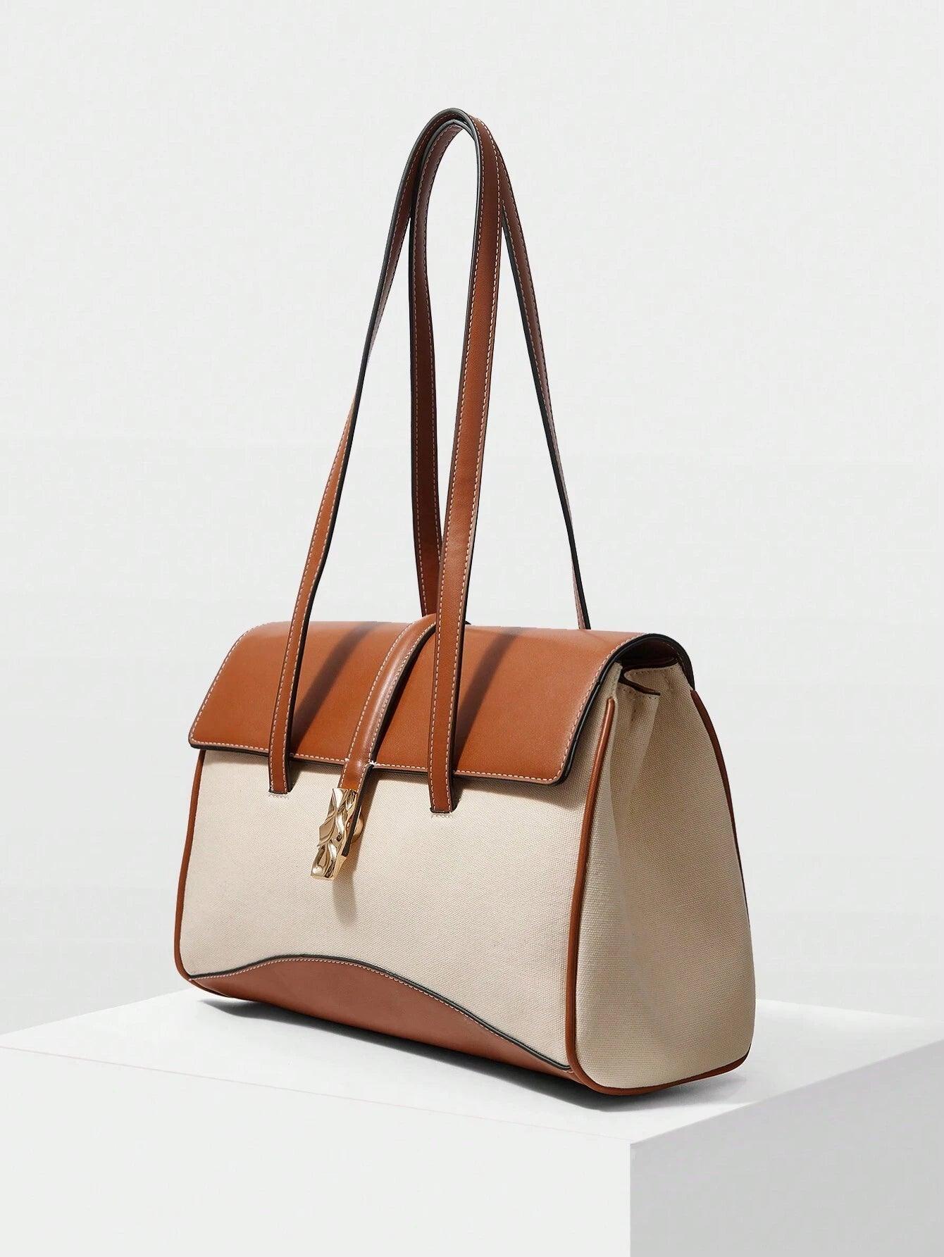 Borsa a spalla da donna con patta bicolore “Roma”